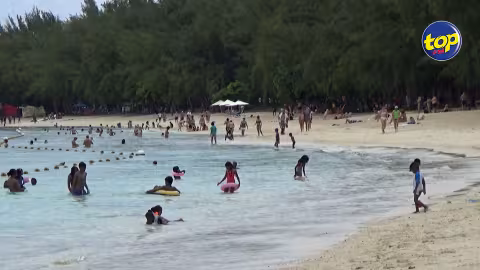 Lundi de Pâques : La plage de Mont-Choisy bondée malgré le temps